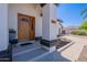 Inviting front entrance with a well-maintained yard and a classic wood door at 1811 E Tierra Buena Ln, Phoenix, AZ 85022