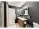 Modern bathroom featuring dual vanity, contemporary fixtures, tiled floors and dark walls for a sleek, modern feel at 1915 S 39Th St # 37, Mesa, AZ 85206