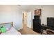 Bedroom featuring a desk and a view into the hallway at 1915 S 39Th St # 37, Mesa, AZ 85206