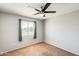 Neutral bedroom featuring a ceiling fan and a window with natural light at 1915 S 39Th St # 37, Mesa, AZ 85206