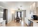 Inviting dining area with a round table and modern lighting at 1915 S 39Th St # 37, Mesa, AZ 85206
