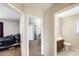 Hallway showcasing access to bedrooms and a bathroom, with neutral walls at 1915 S 39Th St # 37, Mesa, AZ 85206