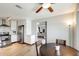 Eat-in kitchen featuring modern appliances and adjacent dining area at 1915 S 39Th St # 37, Mesa, AZ 85206