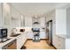 Modern kitchen with white cabinets, stainless steel appliances, white subway tile backsplash, and lots of natural light at 1915 S 39Th St # 37, Mesa, AZ 85206