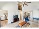 Open concept living room with view of the kitchen and upstairs loft at 1915 S 39Th St # 37, Mesa, AZ 85206