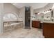 Bathroom features a soaking tub, shower, and dual vanities at 1946 E Caroline Ln, Tempe, AZ 85284