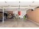 Spacious garage with ample storage cabinets and room for multiple vehicles and projects at 1946 E Caroline Ln, Tempe, AZ 85284