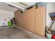 Organized garage with extensive built-in storage cabinets, perfect for keeping your belongings tidy at 1946 E Caroline Ln, Tempe, AZ 85284