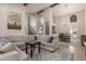 Spacious living area boasting an open layout, vaulted ceilings, and stylish decor, perfect for entertaining guests at 1946 E Caroline Ln, Tempe, AZ 85284