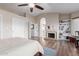 Spacious main bedroom with fireplace and built-in bookshelves at 1946 E Caroline Ln, Tempe, AZ 85284