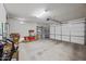Spacious garage with ample storage space, and an automatic garage door opener at 20251 W Hadley St, Buckeye, AZ 85326