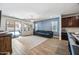 Spacious living room with sliding glass doors and modern finishes, perfect for relaxing at 20251 W Hadley St, Buckeye, AZ 85326