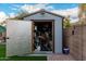 Open shed showcasing ample storage space for tools and equipment, enhancing organization at 2038 N Los Alamos St, Mesa, AZ 85213