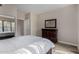 Bright bedroom features wood-look floors, natural light, and neutral décor at 20660 N 40Th St # 1118, Phoenix, AZ 85050