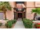 Welcoming entryway with lush landscaping and clearly marked unit numbers enhances curb appeal at 20660 N 40Th St # 1118, Phoenix, AZ 85050
