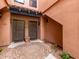 Inviting courtyard with dual entrances and brick accents provides a charming welcome at 20660 N 40Th St # 1118, Phoenix, AZ 85050