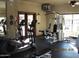 Well-equipped fitness center featuring cardio machines and weightlifting equipment at 20660 N 40Th St # 1118, Phoenix, AZ 85050