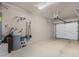 Spacious garage with ample storage, water softener, and automatic door, ready for your vehicles and projects at 20660 N 40Th St # 1118, Phoenix, AZ 85050
