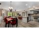Spacious open-plan living area with kitchen, dining area, and seamless access to the outdoors at 20660 N 40Th St # 1118, Phoenix, AZ 85050