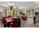 Bright open-plan living area seamlessly connects kitchen, dining, and outdoor spaces at 20660 N 40Th St # 1118, Phoenix, AZ 85050