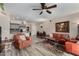 Open-concept living area featuring modern kitchen, dining space, and comfortable seating at 20660 N 40Th St # 1118, Phoenix, AZ 85050