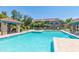Resort-style pool with cabanas and lounge chairs, perfect for relaxation and socializing in a beautiful setting at 20660 N 40Th St # 1118, Phoenix, AZ 85050