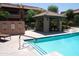 Community pool with covered gazebo and ample seating, creating an inviting space for residents to gather and enjoy at 20660 N 40Th St # 1118, Phoenix, AZ 85050