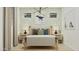 Stylish bedroom with dinosaur decor, natural light, and modern furnishings at 20888 S 231St Way, Queen Creek, AZ 85142