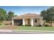 Charming single-story home with a terracotta tiled roof and attached two-car garage at 20888 S 231St Way, Queen Creek, AZ 85142
