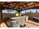 Backyard features a covered patio, a built-in barbecue and a hot tub at 2116 S Shelby --, Mesa, AZ 85209