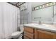 Bathroom with cabinet and sink, mirror and shower at 2116 S Shelby --, Mesa, AZ 85209