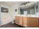 Bathroom featuring a bathtub, shower, double vanity, and neutral decor at 2116 S Shelby --, Mesa, AZ 85209