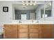 Bathroom features a double sink vanity with framed mirror and recessed lighting at 2116 S Shelby --, Mesa, AZ 85209