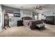 Main bedroom with a large bed, soft colors, and neutral decor at 2116 S Shelby --, Mesa, AZ 85209