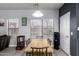 Bright dining room featuring a wooden table and views of the neighborhood at 2116 S Shelby --, Mesa, AZ 85209