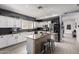 Contemporary kitchen with white cabinets, granite countertops, and stainless steel appliances at 2116 S Shelby --, Mesa, AZ 85209