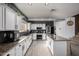 Spacious kitchen with stainless steel appliances, granite countertops, and island at 2116 S Shelby --, Mesa, AZ 85209