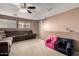 Upstairs living area featuring a large sectional sofa and chairs at 2116 S Shelby --, Mesa, AZ 85209
