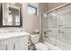 Well-lit bathroom featuring granite countertops, framed mirror, and a shower/tub combo at 2166 N Steele --, Mesa, AZ 85207