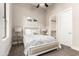 Bright bedroom featuring a upholstered bed frame, neutral walls, and a walk-in closet at 2166 N Steele --, Mesa, AZ 85207
