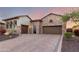 Beautiful single-Gathering home with stone accents, a three-car garage, and a paved driveway at 2166 N Steele --, Mesa, AZ 85207
