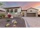 Landscaped front yard featuring cacti, gravel, and a charming stone and stucco facade at 2166 N Steele --, Mesa, AZ 85207