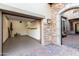 Exterior view of garage with stone accents and access to paved driveway at 2166 N Steele --, Mesa, AZ 85207