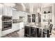 Bright kitchen featuring custom white cabinets, granite countertops, and stainless steel appliances at 2166 N Steele --, Mesa, AZ 85207