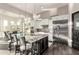Modern kitchen with a granite island, stainless steel appliances, and pendant lighting at 2166 N Steele --, Mesa, AZ 85207