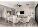 Open-concept living room featuring a ceiling fan, tile floors, and contemporary furnishings at 2166 N Steele --, Mesa, AZ 85207