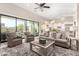 Cozy living room with neutral tones, comfortable seating, and access to the backyard at 2166 N Steele --, Mesa, AZ 85207