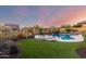 Backyard pool with stone patio and landscaping, perfect for outdoor entertaining at 2166 N Steele --, Mesa, AZ 85207