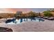 Backyard pool with stone patio and landscaping, perfect for outdoor entertaining at 2166 N Steele --, Mesa, AZ 85207