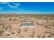 The desert home with a patio and desert landscape is perfect for someone seeking a natural environment at 2248 S Nikki Ln, Maricopa, AZ 85139